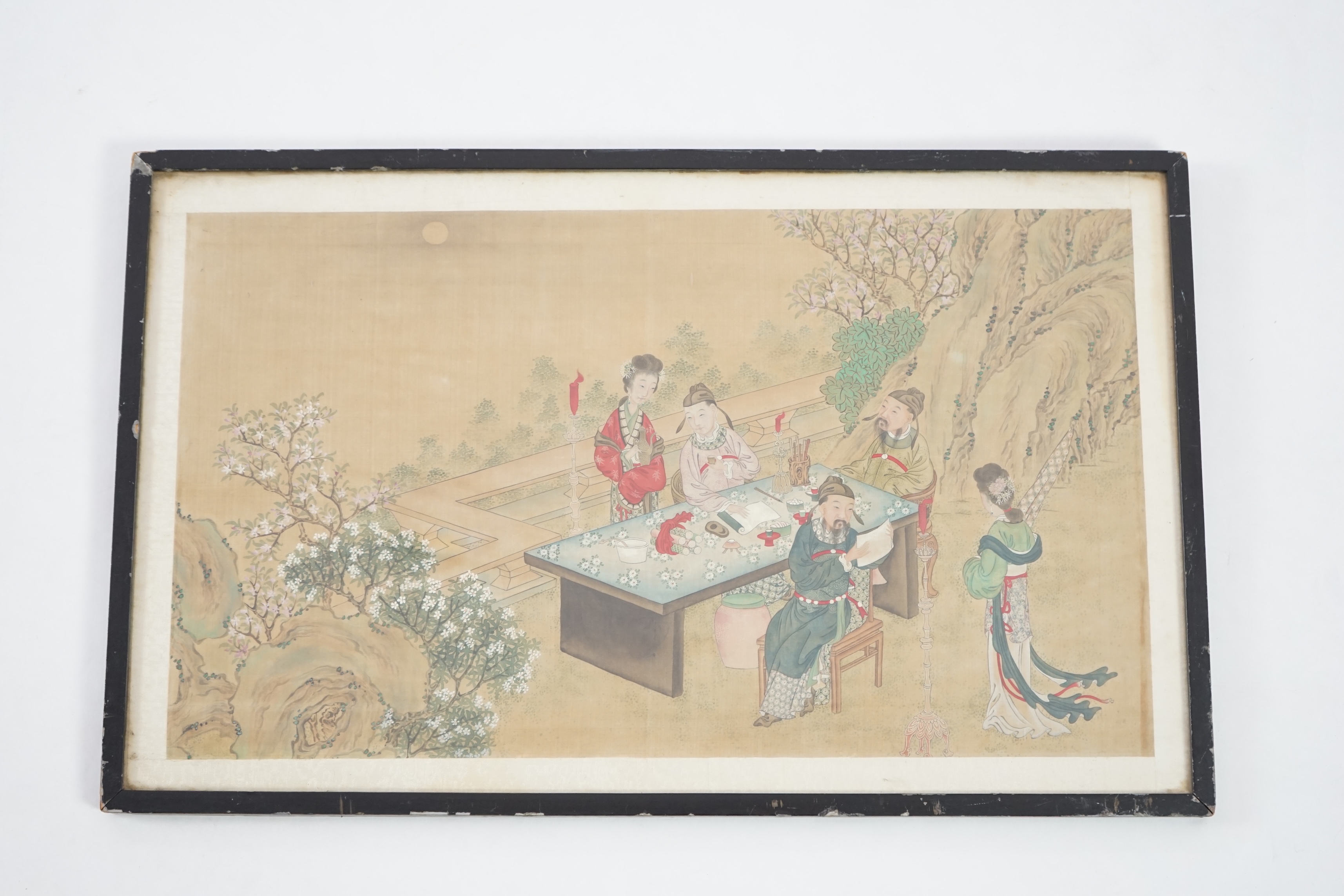 Chinese School, late 19th century, painting on silk, Scholars and attendants in a garden, 35cm x 58cm, framed and glazed. Condition - fair, some general discolouration